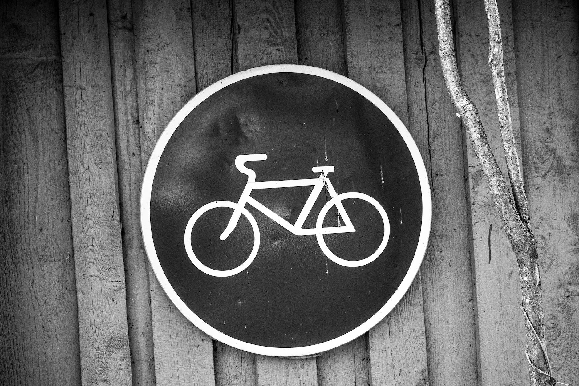 black and white bicycle road sign